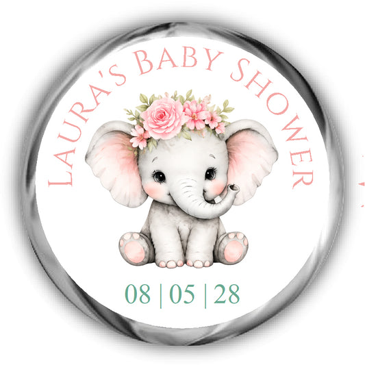 A round custom baby shower sticker featuring a cute cartoon baby elephant wearing a pink rose flower crown.