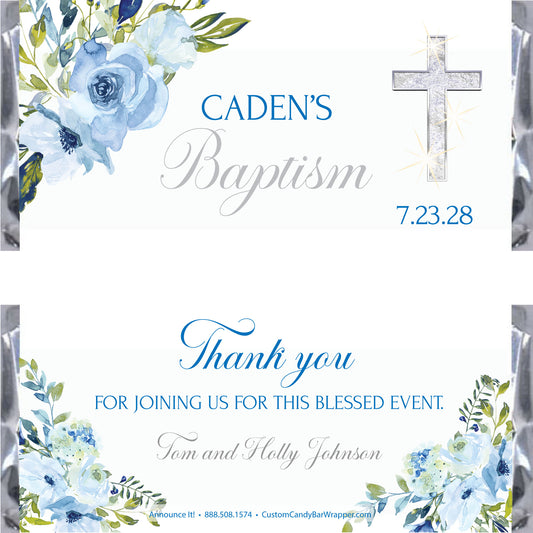 A baptism candy bar wrapper designed with blue watercolor flowers, green leaves, a silver glitter cross