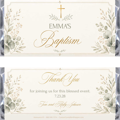 Front and back views of a personalized baptism candy wrapper. The cream-colored wrapper features elegant gold cursive text, a gold cross, and watercolor-style green and gray botanical illustrations on the sides.