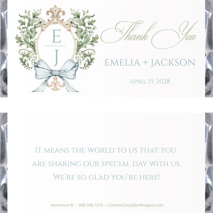 Custom wedding thank you candy bar wrapper featuring a monogrammed floral wreath with a light blue ribbon bow, elegant script text, and personalized event details on a white background.