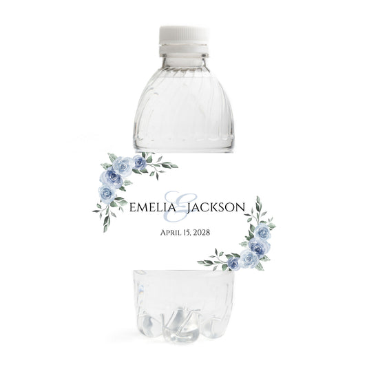 A clear plastic water bottle shown on a white background with a dusty blue wedding design printed label wrapped around it.